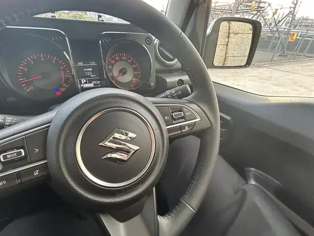 スズキ ジムニー ノマド FC 長崎県 2025(令7)年 0.3万km ベージュⅡ ワンオーナー/衝突軽減システム/レーンアシスト/レーダークルーズ/シートヒーター/スマートキー/プッシュスタート/電動格納ミラー/アイドリングストップ/純正15インチAW