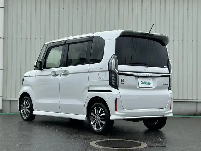 ホンダ Ｎ ＢＯＸ カスタム L 富山県 2023(令5)年 2.6万km プラチナホワイトパール ４WD/純正9インチナビ/フルセグTV/ＤＶＤ再生/Bluetooth/パワースライドドア/バックモニター/前後ドライブレコーダー/前席シートヒーター/衝突軽減ブレーキ/レーダークルーズコントロール/レーンキープアシスト/LEDオートライト/LEDフォグライト/シーケンシャルウィンカー/後方コーナーセンサー/プッシュスタート/ウインカーミラー/アイドリングストップ/ブレーキホールド/電動パーキングブレーキ/USBソケット/冬タイヤ付AW4本積み込み