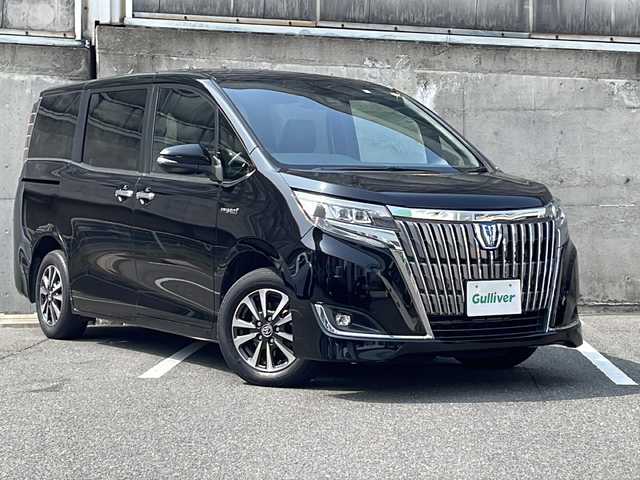 トヨタ エスクァイア ハイブリッド Gi 愛知県 2020(令2)年 8.5万km ブラック ワンオーナー/スペアタイヤ/レザーシート(合皮)/純正SDナビ/フルセグTV・Bluetooth・AM・FM・CD・DVD・SD/バックカメラ/純正後席用フリップダウンモニター/前席シートヒーター/プリクラッシュセーフティ/レーンディパーチャーアラート/クルーズコントロール/クリアランスソナー/LEDヘッドライト/フォグランプ/オートライト/ビルトインETC/ステアリングスイッチ/純正フロアマット/USB2ポート/二列目サンシェード/保証書/点検整備記録簿(R5/R6)