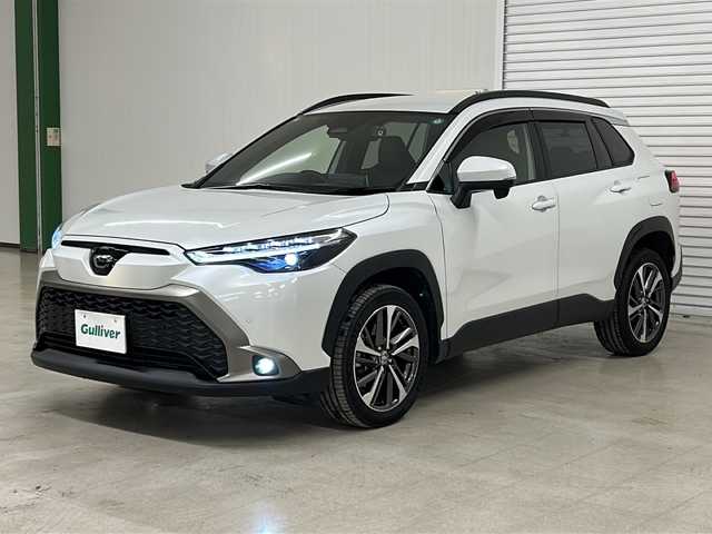トヨタ カローラ クロス ハイブリッド Z 熊本県 2023(令5)年 1.7万km プラチナホワイトパールマイカ 純正ディスプレイオーディオ/（ラジオ/フルセグ/ＢＴ/Applecarplay)/バックカメラ/ＥＴＣ/前後ドライブレコーダー/レーダークルーズコントロール/パワーバックドア/パワーシート/Ｄ・Ｎ席シートヒーター/ステアリングスイッチ/ハーフレザーシート/オートライト/オートハイビーム/フォグランプ/レーンキープアシスト/衝突軽減システム/横滑り防止装置/ブラインドスポットモニター/前後コーナーセンサー/スマートキー×２/純正フロアマット/純正18インチＡＷ/電動パーキングブレーキ（オートホールド付き）/プッシュスタート/ドアバイザー/ルーフレール