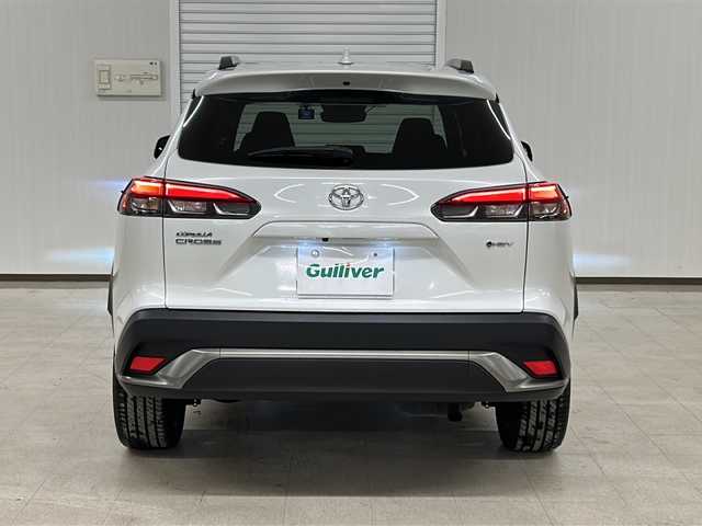 トヨタ カローラ クロス ハイブリッド Z 熊本県 2023(令5)年 1.7万km プラチナホワイトパールマイカ 純正ディスプレイオーディオ/（ラジオ/フルセグ/ＢＴ/Applecarplay)/バックカメラ/ＥＴＣ/前後ドライブレコーダー/レーダークルーズコントロール/パワーバックドア/パワーシート/Ｄ・Ｎ席シートヒーター/ステアリングスイッチ/ハーフレザーシート/オートライト/オートハイビーム/フォグランプ/レーンキープアシスト/衝突軽減システム/横滑り防止装置/ブラインドスポットモニター/前後コーナーセンサー/スマートキー×２/純正フロアマット/純正18インチＡＷ/電動パーキングブレーキ（オートホールド付き）/プッシュスタート/ドアバイザー/ルーフレール