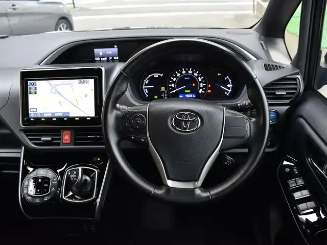 トヨタ ヴォクシー ハイブリッド ZS 煌Ⅲ 福岡県 2021(令3)年 4.6万km イナズマスパーキングブラックガラスフレーク トヨタセーフティセンス/純正9インチメモリーナビ/純正後席フリップダウンモニター/フルセグTV/CD/DVD/BT/バックカメラ/純正前後ドライブレコーダー/純正LEDヘッドライト/純正16インチアルミホイール/両側パワースライドドア/クルーズコントロール/ハーフレザーシート/前席シートヒーター/クリアランスソナー/ビルトインETC/プッシュスタート/スマートキー×2/新車時保証所/取扱説明書