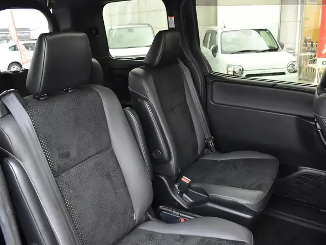 トヨタ ヴォクシー ハイブリッド ZS 煌Ⅲ 福岡県 2021(令3)年 4.6万km イナズマスパーキングブラックガラスフレーク トヨタセーフティセンス/純正9インチメモリーナビ/純正後席フリップダウンモニター/フルセグTV/CD/DVD/BT/バックカメラ/純正前後ドライブレコーダー/純正LEDヘッドライト/純正16インチアルミホイール/両側パワースライドドア/クルーズコントロール/ハーフレザーシート/前席シートヒーター/クリアランスソナー/ビルトインETC/プッシュスタート/スマートキー×2/新車時保証所/取扱説明書