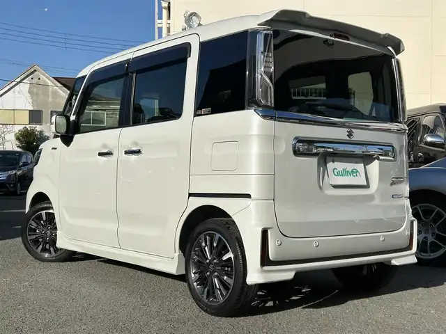 スズキ スペーシア カスタム HYBRID XS 和歌山県 2022(令4)年 0.5万km ピュアホワイトP Panasonic8インチメモリーナビ（フルセグTV/FM/AM/SD/USB/iPod/USB/Bluetooth/MEMORYMUSIC）/バックカメラ/ETC/両側パワースライドドア/アイドリングストップ/クルーズコントロール/オートライト/横滑り防止装置/ベンチシート/衝突被害軽減ブレーキ/HUD/シートヒーター/純正アルミホイール/純正ドアバイザー/純正フロアマット/取扱説明書/保証書