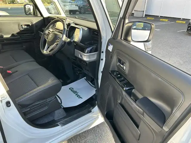 スズキ スペーシア カスタム HYBRID XS 和歌山県 2022(令4)年 0.5万km ピュアホワイトP Panasonic8インチメモリーナビ（フルセグTV/FM/AM/SD/USB/iPod/USB/Bluetooth/MEMORYMUSIC）/バックカメラ/ETC/両側パワースライドドア/アイドリングストップ/クルーズコントロール/オートライト/横滑り防止装置/ベンチシート/衝突被害軽減ブレーキ/HUD/シートヒーター/純正アルミホイール/純正ドアバイザー/純正フロアマット/取扱説明書/保証書