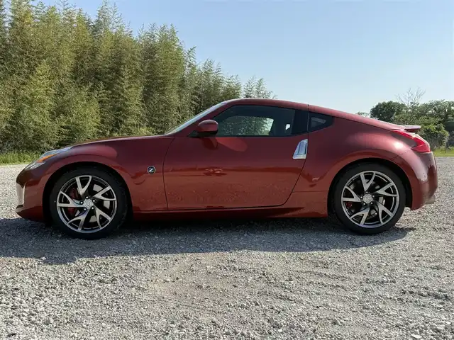 日産 フェアレディ Ｚ バージョンST 兵庫県 2012(平24)年 3.8万km プレミアムサンフレアオレンジ フジツボマフラー/メーカーナビ/フルセグTV/バックモニター/BOSEサウンド/純正19インチAW/ハーフレザーシート/キセノンヘッドライト/オートライト