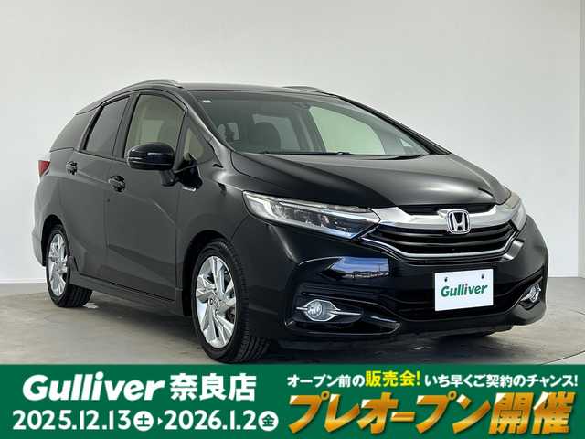 ホンダ シャトル ハイブリッド Z 奈良県 2017(平29)年 2.7万km クリスタルブラックパール 純正ギャザーズナビ/フルセグ CD DVD BT MSV AUX/バックカメラ/ビルトインETC/クルーズコントロール/車両接近通報告知/衝突軽減ブレーキ/ハーフレザーシート/シートヒーター/パドルシフト/LEDヘッドライト/オートライト/電動格納ミラー/スマートキー