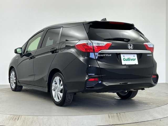 ホンダ シャトル ハイブリッド Z 奈良県 2017(平29)年 2.7万km クリスタルブラックパール 純正ギャザーズナビ/フルセグ CD DVD BT MSV AUX/バックカメラ/ビルトインETC/クルーズコントロール/車両接近通報告知/衝突軽減ブレーキ/ハーフレザーシート/シートヒーター/パドルシフト/LEDヘッドライト/オートライト/電動格納ミラー/スマートキー