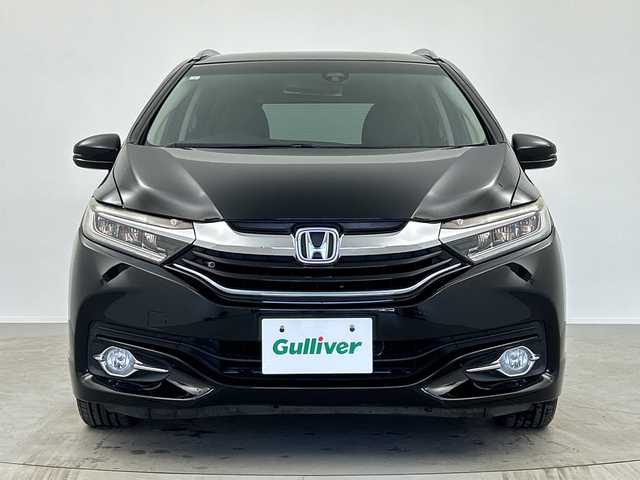 ホンダ シャトル ハイブリッド Z 奈良県 2017(平29)年 2.7万km クリスタルブラックパール 純正ギャザーズナビ/フルセグ CD DVD BT MSV AUX/バックカメラ/ビルトインETC/クルーズコントロール/車両接近通報告知/衝突軽減ブレーキ/ハーフレザーシート/シートヒーター/パドルシフト/LEDヘッドライト/オートライト/電動格納ミラー/スマートキー