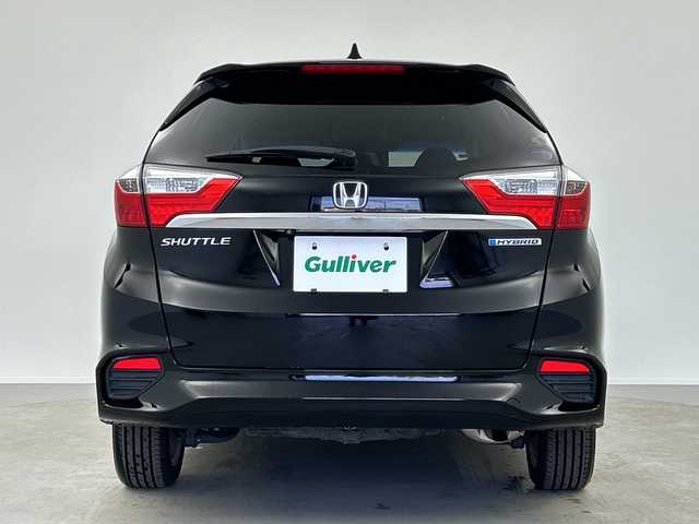 ホンダ シャトル ハイブリッド Z 奈良県 2017(平29)年 2.7万km クリスタルブラックパール 純正ギャザーズナビ/フルセグ CD DVD BT MSV AUX/バックカメラ/ビルトインETC/クルーズコントロール/車両接近通報告知/衝突軽減ブレーキ/ハーフレザーシート/シートヒーター/パドルシフト/LEDヘッドライト/オートライト/電動格納ミラー/スマートキー