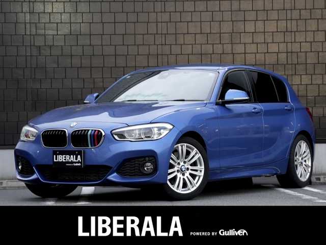 ＢＭＷ １１８ｉ Mスポーツパッケージ 静岡県 2016(平28)年 6.1万km エストリル・ブルー インテリジェントセーフティ /衝突軽減ブレーキ 車線逸脱警告/アルカンターラ　ファブリックコンビシート/IdriveHDDナビBluetooth DVD USB AUX/HIDヘッドライト/オートライト/17インチアルミホイール /前後ドライブレコーダー/リヤガラスフィルム施工/ミラー一体型ETC/キーレスx2