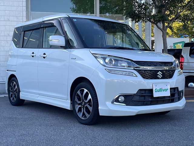スズキ ソリオ バンディット HV MV Dカメラ ブレーキS 鳥取県 2018(平30)年 5.5万km ピュアホワイトP 登録時走行距離：54261km/4WD/ディーラー純正ケンウッド製8型メモリナビ/　CD DVD BT フルセグTV/バックカメラ/パワースライドドア/デュアルカメラブレーキサポート/クルーズコントロール/LEDヘッドライト/オートライト/フォグランプ/シートヒーター/ロールサンシェード/ISOFIX/シート下収納/革巻きステアリング/ステアリングスイッチ/プッシュスタート/スマートキー/スペアキー/新車時保証書