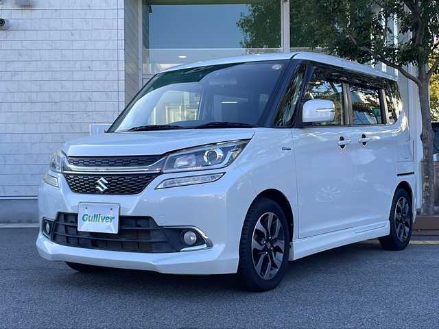 スズキ ソリオ バンディット HV MV Dカメラ ブレーキS 鳥取県 2018(平30)年 5.5万km ピュアホワイトP 登録時走行距離：54261km/4WD/ディーラー純正ケンウッド製8型メモリナビ/　CD DVD BT フルセグTV/バックカメラ/パワースライドドア/デュアルカメラブレーキサポート/クルーズコントロール/LEDヘッドライト/オートライト/フォグランプ/シートヒーター/ロールサンシェード/ISOFIX/シート下収納/革巻きステアリング/ステアリングスイッチ/プッシュスタート/スマートキー/スペアキー/新車時保証書