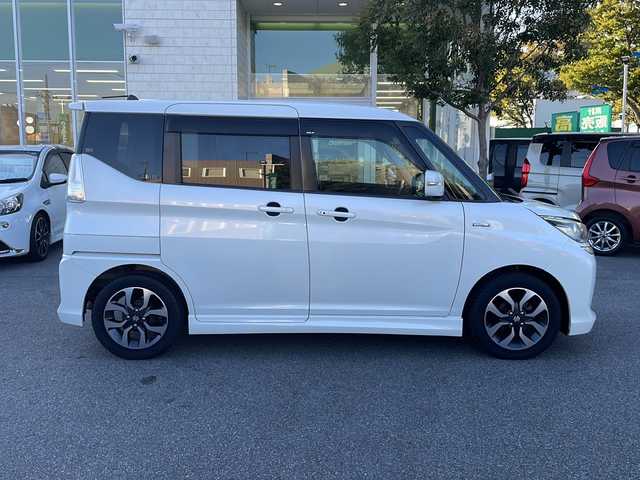 スズキ ソリオ バンディット HV MV Dカメラ ブレーキS 鳥取県 2018(平30)年 5.5万km ピュアホワイトP 登録時走行距離：54261km/4WD/ディーラー純正ケンウッド製8型メモリナビ/　CD DVD BT フルセグTV/バックカメラ/パワースライドドア/デュアルカメラブレーキサポート/クルーズコントロール/LEDヘッドライト/オートライト/フォグランプ/シートヒーター/ロールサンシェード/ISOFIX/シート下収納/革巻きステアリング/ステアリングスイッチ/プッシュスタート/スマートキー/スペアキー/新車時保証書