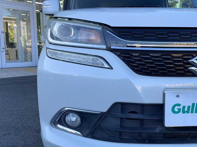 スズキ ソリオ バンディット HV MV Dカメラ ブレーキS 鳥取県 2018(平30)年 5.5万km ピュアホワイトP 登録時走行距離：54261km/4WD/ディーラー純正ケンウッド製8型メモリナビ/　CD DVD BT フルセグTV/バックカメラ/パワースライドドア/デュアルカメラブレーキサポート/クルーズコントロール/LEDヘッドライト/オートライト/フォグランプ/シートヒーター/ロールサンシェード/ISOFIX/シート下収納/革巻きステアリング/ステアリングスイッチ/プッシュスタート/スマートキー/スペアキー/新車時保証書