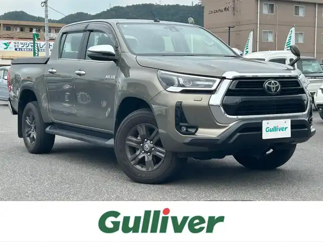 トヨタ ハイラックス Z 広島県 2022(令4)年 5.6万km オキサイドブロンズM 純正ベッドライナー/GRハードトノカバー（ダンパー付き）/純正マッドフラップ/ワンオーナー/純正ナビ/（CD/DVD/フルセグTV/Bluetooth/HDMI）/バックカメラ/ETC/前後ドライブレコーダー/レザー調シートカバー/レーダークルーズコントロール/衝突被害軽減ブレーキ/車線逸脱警報/コーナーセンサー/LEDヘッドライト/スペアキー