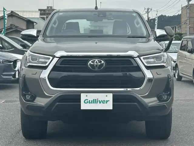 トヨタ ハイラックス Z 広島県 2022(令4)年 5.6万km オキサイドブロンズM 純正ベッドライナー/GRハードトノカバー（ダンパー付き）/純正マッドフラップ/ワンオーナー/純正ナビ/（CD/DVD/フルセグTV/Bluetooth/HDMI）/バックカメラ/ETC/前後ドライブレコーダー/レザー調シートカバー/レーダークルーズコントロール/衝突被害軽減ブレーキ/車線逸脱警報/コーナーセンサー/LEDヘッドライト/スペアキー