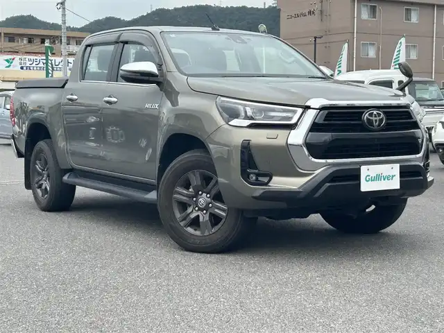 トヨタ ハイラックス Z 広島県 2022(令4)年 5.6万km オキサイドブロンズM 純正ベッドライナー/GRハードトノカバー（ダンパー付き）/純正マッドフラップ/ワンオーナー/純正ナビ/（CD/DVD/フルセグTV/Bluetooth/HDMI）/バックカメラ/ETC/前後ドライブレコーダー/レザー調シートカバー/レーダークルーズコントロール/衝突被害軽減ブレーキ/車線逸脱警報/コーナーセンサー/LEDヘッドライト/スペアキー