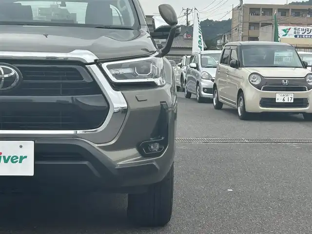 トヨタ ハイラックス Z 広島県 2022(令4)年 5.6万km オキサイドブロンズM 純正ベッドライナー/GRハードトノカバー（ダンパー付き）/純正マッドフラップ/ワンオーナー/純正ナビ/（CD/DVD/フルセグTV/Bluetooth/HDMI）/バックカメラ/ETC/前後ドライブレコーダー/レザー調シートカバー/レーダークルーズコントロール/衝突被害軽減ブレーキ/車線逸脱警報/コーナーセンサー/LEDヘッドライト/スペアキー