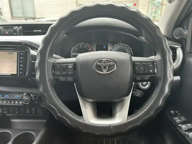トヨタ ハイラックス Z 広島県 2022(令4)年 5.6万km オキサイドブロンズM 純正ベッドライナー/GRハードトノカバー（ダンパー付き）/純正マッドフラップ/ワンオーナー/純正ナビ/（CD/DVD/フルセグTV/Bluetooth/HDMI）/バックカメラ/ETC/前後ドライブレコーダー/レザー調シートカバー/レーダークルーズコントロール/衝突被害軽減ブレーキ/車線逸脱警報/コーナーセンサー/LEDヘッドライト/スペアキー