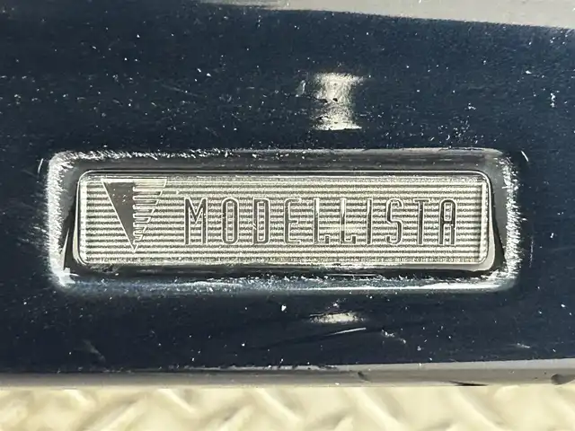 トヨタ ハリアー ハイブリッド プレミアム アドバンスドP 道央・札幌 2016(平28)年 7.7万km ブラッキッシュアゲハガラスフレーク ・４WD/・モデリスタエアロ/・MOP８インチSDナビ/　CD/DVD/USB/SD/BT/フルセグTV/・TV-Kit/・ステアリングスイッチ/・パノラミックビューモニター/・ビルトインETC/・アダプティブクルーズコントロール/・衝突軽減被害ブレーキ/・レーンキープアシスト/・クリアランスソナー/・アイドリングストップ/・横滑り防止装置/・ABS/・オートマチックハイビーム/・オートライト/・LEDヘッドライト/・フォグランプ/・パワーバックドア/・ハーフレザーシート/・D席パワーシート/・純正フロアマット/・プッシュスタート/・スマートキー/・取/保/記