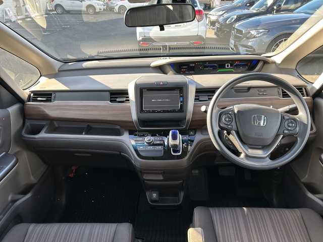 ホンダ フリード ハイブリット G ホンダセンシング 長野県 2019(令1)年 3.5万km フォレストグリーンパール ・純正7インチSDナビゲーション/CD DVD フルセグTV Bluetooth/・バックカメラ/・ETC/・ホンダセンシング/・レーダークルーズコントロール/・オートマチックハイビーム/・レーンキープアシスト/・LEDヘッドライト/・オートライト/・ドライブレコーダー/・両側パワースライドドア/・ウィンカーミラー/・電動格納ミラー/・スマートキー/・エンジンプッシュスタート