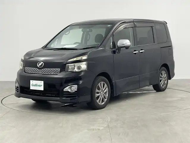 トヨタ ヴォクシー ZS 煌 愛知県 2011(平23)年 13.8万km ブラック ナビＮＨＤＴ－Ｗ６０Ｇ　/バックカメラ　/ＥＴＣ　/ＨＩＤライト　/両側パワスラ　/前後ドラレコ　/プッシュスタート　/ワンセグＴＶ　/アルミホイール　/スマートキー　/フロアマット　/オートエアコン　/電格ミラー　/フォグ