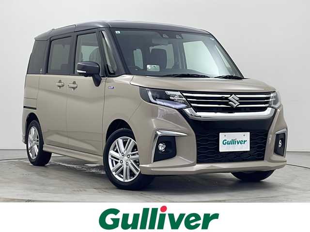スズキ ソリオ HV MZ 秋田県 2024(令6)年 0.1万km未満 キャラバンアイボリーパールM / ガンメタリック2トーン 4WD/スズキセーフティサポート/両側パワースライドドア/レーダークルーズコントロール/ステアリングスイッチ/革巻きハンドル/USB/前席シートヒーター/電動格納ミラー/ヘッドアップディスプレイ（HUD）/純正フロアマット/純正15インチアルミホイール/コーナーセンサー/LEDヘッドライト/フォグランプ/オートライト/スマートキー/スペアキー