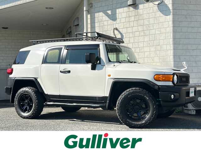 トヨタ ＦＪクルーザー 神奈川県 2016(平28)年 4.6万km ホワイト 純正ディーラーナビ(CD/SD/BT/フルセグTV)/バックカメラ/Weds17ンチアルミ(KEELER FORCE)/BajaRackルーフラック/YAKIMAサイクルラック/リモコンキー/クルーズコントロール/パーキングセンサー/横滑り防止装置/アクティブトラクションコントロール/黒レザー調シートカバー/デジタルインナーミラー/ETC/純正フロアマット/純正ドアバイザー/スペアキー×1/保証書/取扱説明書