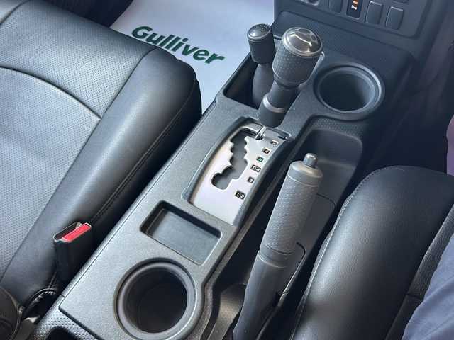 トヨタ ＦＪクルーザー 神奈川県 2016(平28)年 4.6万km ホワイト 純正ディーラーナビ(CD/SD/BT/フルセグTV)/バックカメラ/Weds17ンチアルミ(KEELER FORCE)/BajaRackルーフラック/YAKIMAサイクルラック/リモコンキー/クルーズコントロール/パーキングセンサー/横滑り防止装置/アクティブトラクションコントロール/黒レザー調シートカバー/デジタルインナーミラー/ETC/純正フロアマット/純正ドアバイザー/スペアキー×1/保証書/取扱説明書