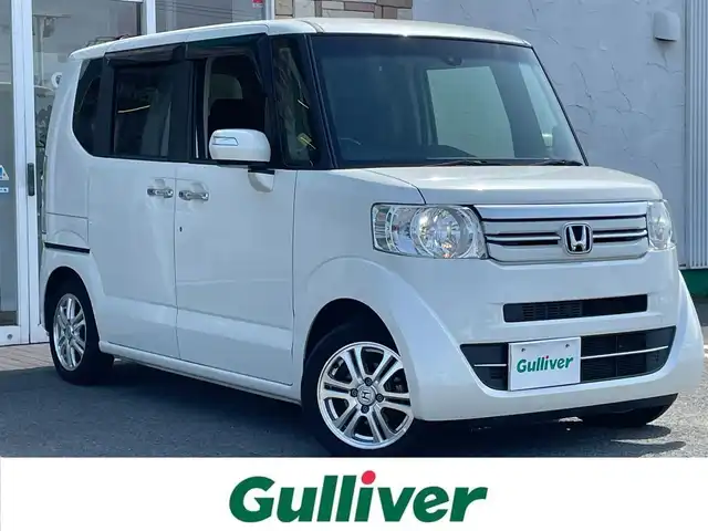 ホンダ Ｎ ＢＯＸ G ターボ SSパッケージ 徳島県 2016(平28)年 5.1万km プレミアムホワイトパールⅡ 社外メモリナビ　CN-S310D/TV/Bluetooth/AM/FM/SD/USB/クルーズコントロール/ETC/両側電動スライドドア/バックカメラ/アイドリングストップ/オートライト/純正14インチアルミホイール/純正フロアマット/シートヒーター/サイドアンダーミラー/シティブレーキアクティブシステム/ECONモード/ドアバイザー/盗難防止措置/ワンオーナー/新車時取扱説明書