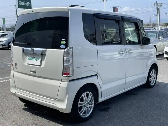 ホンダ Ｎ ＢＯＸ G ターボ SSパッケージ 徳島県 2016(平28)年 5.1万km プレミアムホワイトパールⅡ 社外メモリナビ　CN-S310D/TV/Bluetooth/AM/FM/SD/USB/クルーズコントロール/ETC/両側電動スライドドア/バックカメラ/アイドリングストップ/オートライト/純正14インチアルミホイール/純正フロアマット/シートヒーター/サイドアンダーミラー/シティブレーキアクティブシステム/ECONモード/ドアバイザー/盗難防止措置/ワンオーナー/新車時取扱説明書