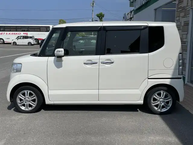 ホンダ Ｎ ＢＯＸ G ターボ SSパッケージ 徳島県 2016(平28)年 5.1万km プレミアムホワイトパールⅡ 社外メモリナビ　CN-S310D/TV/Bluetooth/AM/FM/SD/USB/クルーズコントロール/ETC/両側電動スライドドア/バックカメラ/アイドリングストップ/オートライト/純正14インチアルミホイール/純正フロアマット/シートヒーター/サイドアンダーミラー/シティブレーキアクティブシステム/ECONモード/ドアバイザー/盗難防止措置/ワンオーナー/新車時取扱説明書