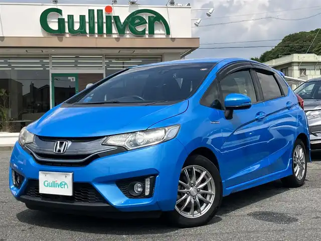 ホンダ フィット ハイブリット Sパッケージ 三重県 2014(平26)年 12万km ビビットスカイブルーP 車検R9年1月25日/♪純正インターナビ/ ・フルセグ・CD/DVD再生/ ・Bluetooth・HDMI/ ・USB/♪バックカメラ/♪シティブレーキアクティブシステム(CTBA)/♪クルーズコントロール/♪スマートキー/♪プッシュスタート/♪LEDヘッドライト/♪フォグライト/♪オートライト/♪ウィンカーミラー/♪アイドリングストップ/♪革巻ステアリング/♪ステアリングスイッチ/♪パドルシフト/♪ビルトインETC/♪フロアマット/♪ドアバイザー/♪プライバシーガラス/♪電格ミラー/♪サイド/カーテンエアバック