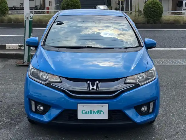 ホンダ フィット ハイブリット Sパッケージ 三重県 2014(平26)年 12万km ビビットスカイブルーP 車検R9年1月25日/♪純正インターナビ/ ・フルセグ・CD/DVD再生/ ・Bluetooth・HDMI/ ・USB/♪バックカメラ/♪シティブレーキアクティブシステム(CTBA)/♪クルーズコントロール/♪スマートキー/♪プッシュスタート/♪LEDヘッドライト/♪フォグライト/♪オートライト/♪ウィンカーミラー/♪アイドリングストップ/♪革巻ステアリング/♪ステアリングスイッチ/♪パドルシフト/♪ビルトインETC/♪フロアマット/♪ドアバイザー/♪プライバシーガラス/♪電格ミラー/♪サイド/カーテンエアバック