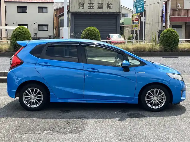 ホンダ フィット ハイブリット Sパッケージ 三重県 2014(平26)年 12万km ビビットスカイブルーP 車検R9年1月25日/♪純正インターナビ/ ・フルセグ・CD/DVD再生/ ・Bluetooth・HDMI/ ・USB/♪バックカメラ/♪シティブレーキアクティブシステム(CTBA)/♪クルーズコントロール/♪スマートキー/♪プッシュスタート/♪LEDヘッドライト/♪フォグライト/♪オートライト/♪ウィンカーミラー/♪アイドリングストップ/♪革巻ステアリング/♪ステアリングスイッチ/♪パドルシフト/♪ビルトインETC/♪フロアマット/♪ドアバイザー/♪プライバシーガラス/♪電格ミラー/♪サイド/カーテンエアバック