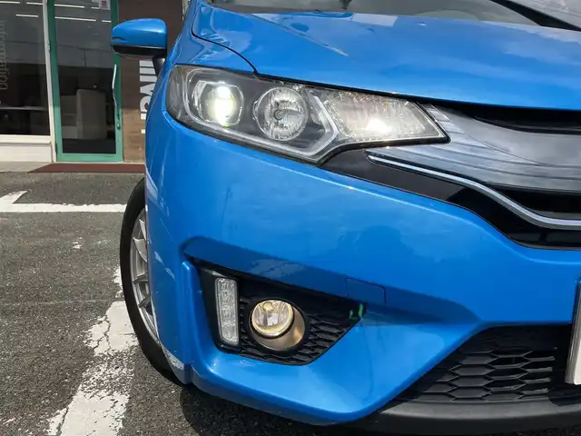 ホンダ フィット ハイブリット Sパッケージ 三重県 2014(平26)年 12万km ビビットスカイブルーP 車検R9年1月25日/♪純正インターナビ/ ・フルセグ・CD/DVD再生/ ・Bluetooth・HDMI/ ・USB/♪バックカメラ/♪シティブレーキアクティブシステム(CTBA)/♪クルーズコントロール/♪スマートキー/♪プッシュスタート/♪LEDヘッドライト/♪フォグライト/♪オートライト/♪ウィンカーミラー/♪アイドリングストップ/♪革巻ステアリング/♪ステアリングスイッチ/♪パドルシフト/♪ビルトインETC/♪フロアマット/♪ドアバイザー/♪プライバシーガラス/♪電格ミラー/♪サイド/カーテンエアバック