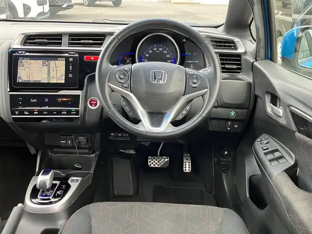 ホンダ フィット ハイブリット Sパッケージ 三重県 2014(平26)年 12万km ビビットスカイブルーP 車検R9年1月25日/♪純正インターナビ/ ・フルセグ・CD/DVD再生/ ・Bluetooth・HDMI/ ・USB/♪バックカメラ/♪シティブレーキアクティブシステム(CTBA)/♪クルーズコントロール/♪スマートキー/♪プッシュスタート/♪LEDヘッドライト/♪フォグライト/♪オートライト/♪ウィンカーミラー/♪アイドリングストップ/♪革巻ステアリング/♪ステアリングスイッチ/♪パドルシフト/♪ビルトインETC/♪フロアマット/♪ドアバイザー/♪プライバシーガラス/♪電格ミラー/♪サイド/カーテンエアバック