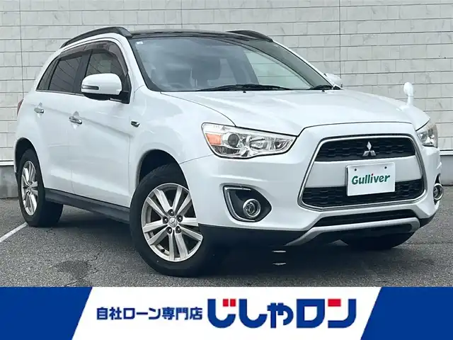 三菱 ＲＶＲ G 東京都 2013(平25)年 5万km シルキーホワイト (株)IDOMが運営する【じしゃロン昭島店】の自社ローン専用車両になります。こちらは現金またはオートローンご利用時の価格です。自社ローンご希望の方は別途その旨お申付け下さい		/４ＷＤ　/純正アルミホイール　/社外ＳＤナビ【ＣＤ／ＤＶＤ／フルセグＴＶ】　/ＥＴＣ　/スカイルーフ　/パドルシフト/クルーズコントロール　/横滑り防止装置　/アンチロックブレーキシステム　/盗難防止システム　/オートライト/フォグランプ/エンジンスタートボタン/オートエアコン