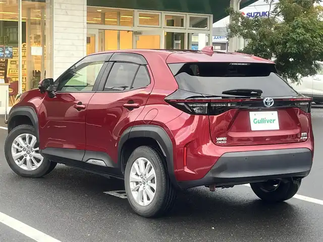 トヨタ ヤリスクロス ハイブリッド G 島根県 2021(令3)年 5.8万km センシュアルレッドマイカ 4WD/純正メモリナビ　/(AM/FM/フルセグTV/Ｂｌｕｅｔｏｏｔｈ接続)/前後ドライブレコーダー　/ビルトインＥＴＣ　/バックカメラ/クルーズコントロール　/ブラインドスポットモニター/前後コーナーセンサー　/レーンアシスト/プリクラッシュセーフティ　/パワーバックドア　/前席シートヒーター/ステアリングヒーター/電動パーキングブレーキ/オートホールド　/オートハイビーム／ライト　/純正16インチアルミホイール/純正フロアマット/スペアキー1本