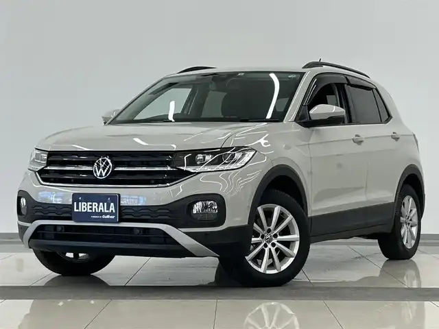 フォルクスワーゲン ＶＷ Ｔ－クロス TSI アクティブ 岡山県 2022(令4)年 1.1万km グレー ワンオーナー/メモリナビ/バックカメラ/アイドリングストップ/アダプティブクルーズコントロール/プッシュスタート/ETC2.0/Android Auto/Apple CarPlay/Mirror　Link/ブラインド・スポット・ディテクション/純正アルミ付きサマータイヤ4本/LEDヘッドライト/ライトアシスト/ACC/レーンキーピングアシストシステム/疲労検知システム/プロアクティブ・オキュマント・プロテクション/パークディスタンスコントロール/ドアバイザー