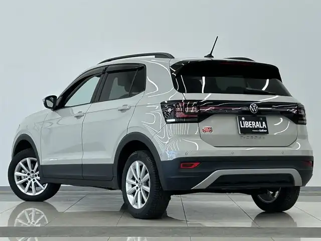 フォルクスワーゲン ＶＷ Ｔ－クロス TSI アクティブ 岡山県 2022(令4)年 1.1万km グレー ワンオーナー/メモリナビ/バックカメラ/アイドリングストップ/アダプティブクルーズコントロール/プッシュスタート/ETC2.0/Android Auto/Apple CarPlay/Mirror　Link/ブラインド・スポット・ディテクション/純正アルミ付きサマータイヤ4本/LEDヘッドライト/ライトアシスト/ACC/レーンキーピングアシストシステム/疲労検知システム/プロアクティブ・オキュマント・プロテクション/パークディスタンスコントロール/ドアバイザー