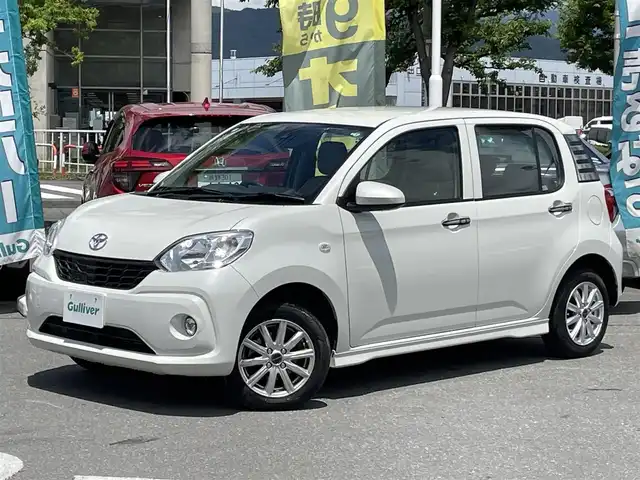 トヨタ パッソ X　S 長野県 2018(平30)年 1.3万km レディッシュブラウンマイカM/ライトウォームグレーM 社外ナビ（FM/AM、CD、DVD、BT、USB、AUX）/フルセグテレビ/バックカメラ/アイドリングストップ/レーンキープアシスト/後方コーナーセンサー/横滑り防止装置/純正フロアマット/社外１４AW/LEDオートライト/ダブルエアバック/スマートキ―/ABS/保証書、取扱説明書/４WD
