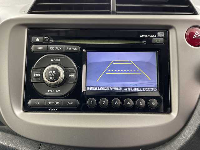 ホンダ フィット G 道央・札幌 2010(平22)年 7.9万km プレミアムホワイトパール ・4WD/・ワンオーナー/・純正オーディオ/・CD/USB/・バックカメラ/ETC/・電動格納ミラー/・盗難防止装置/・純正フロアマット/・ABS/ECON/・ドアバイザー/・リモコンキー/・保証書