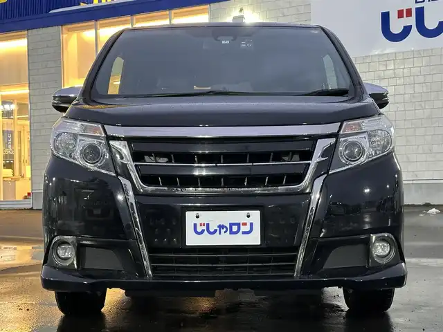 トヨタ エスクァイア Gi ブラックテーラード 道北・旭川 2016(平28)年 13万km ブラック (株)IDOMが運営する【じしゃロン旭川店】の自社ローン対象車両になります。こちらは現金ご利用時の価格です。自社ローンご希望の方は別途その旨お申付け下さい。/　/・純正ナビ(CD/DVD/BT/SD/フルセグ)/・バックカメラ/・ETC/・ドライブレコーダー/・レーダーブレーキ/・クルーズコントロール/・両側パワースライドドア/・両席シートヒーター/・電動格納ウィンカーミラー/・プッシュスタート/・スマートキー2個/・フォグランプ/・現車装着サマータイヤ 純正AW195/65R15