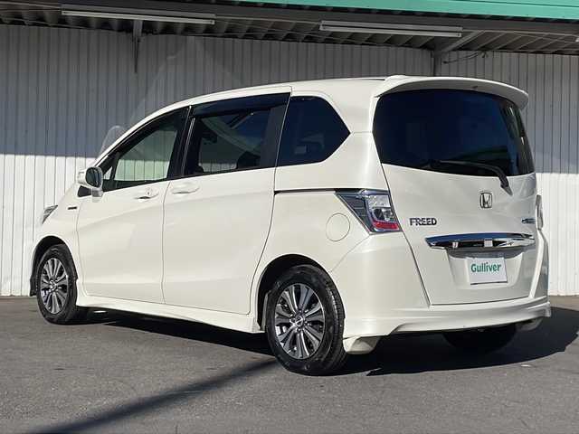 ホンダ フリード ハイブリット ジャストセレクション 長野県 2013(平25)年 5.8万km プレミアムホワイトパール ケンウッドメモリナビフルセグTV/バックカメラ/ETC/両側パワースライドドア/ハーフレザーシート/クリアランスソナー/純正15インチアルミ/横滑り防止装置/保証書