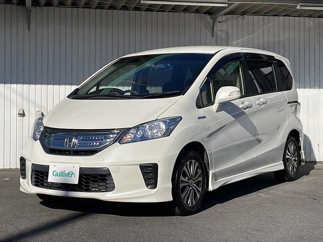 ホンダ フリード ハイブリット ジャストセレクション 長野県 2013(平25)年 5.8万km プレミアムホワイトパール ケンウッドメモリナビフルセグTV/バックカメラ/ETC/両側パワースライドドア/ハーフレザーシート/クリアランスソナー/純正15インチアルミ/横滑り防止装置/保証書