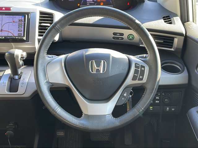 ホンダ フリード ハイブリット ジャストセレクション 長野県 2013(平25)年 5.8万km プレミアムホワイトパール ケンウッドメモリナビフルセグTV/バックカメラ/ETC/両側パワースライドドア/ハーフレザーシート/クリアランスソナー/純正15インチアルミ/横滑り防止装置/保証書