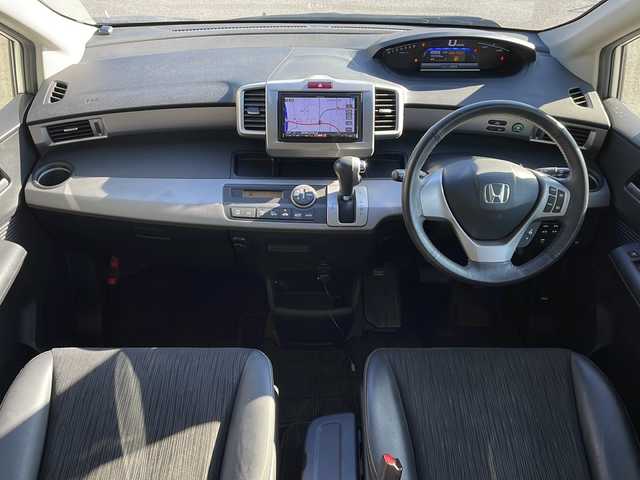 ホンダ フリード ハイブリット ジャストセレクション 長野県 2013(平25)年 5.8万km プレミアムホワイトパール ケンウッドメモリナビフルセグTV/バックカメラ/ETC/両側パワースライドドア/ハーフレザーシート/クリアランスソナー/純正15インチアルミ/横滑り防止装置/保証書