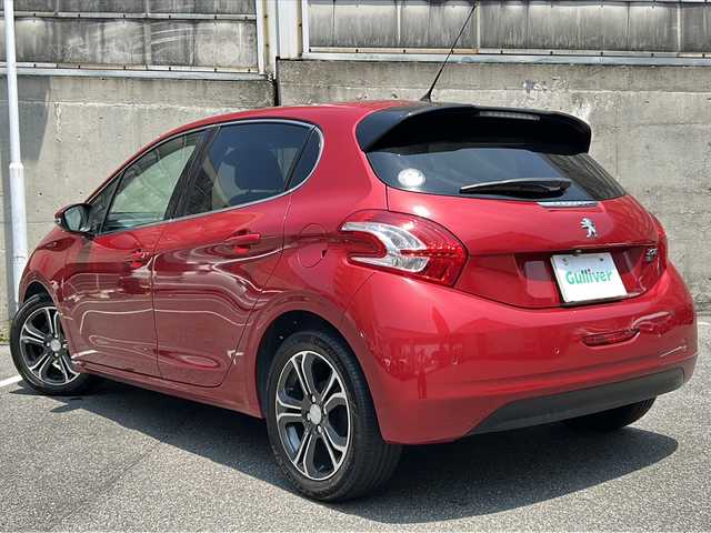 プジョー ２０８ シエロ 愛知県 2014(平26)年 5.4万km 赤 スカイルーフ/ECLIPSE製メモリーナビゲーション/フルセグTV・AM・FM・Bluetooth・AUX・CD・DVD/バックカメラ/ハーフレザーシート（黒）/前方ドライブレコーダー/本革巻きステアリング/クルーズコントロール/コーナーセンサー/ETC/オートライト/パドルシフト/フォグランプ/アームレスト/電動格納ミラー/ISOFIX/取扱説明書/点検整備記録簿あり(H27/H28/H29/R1/R3/R5)/保証書/スペアキー